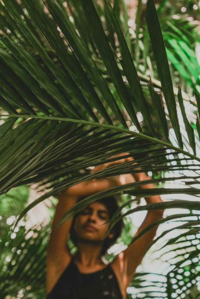 person raising both hands