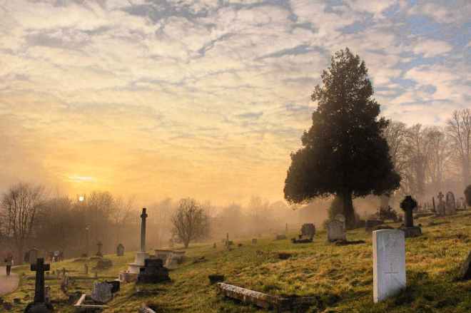 cemetery under the cloudy sky