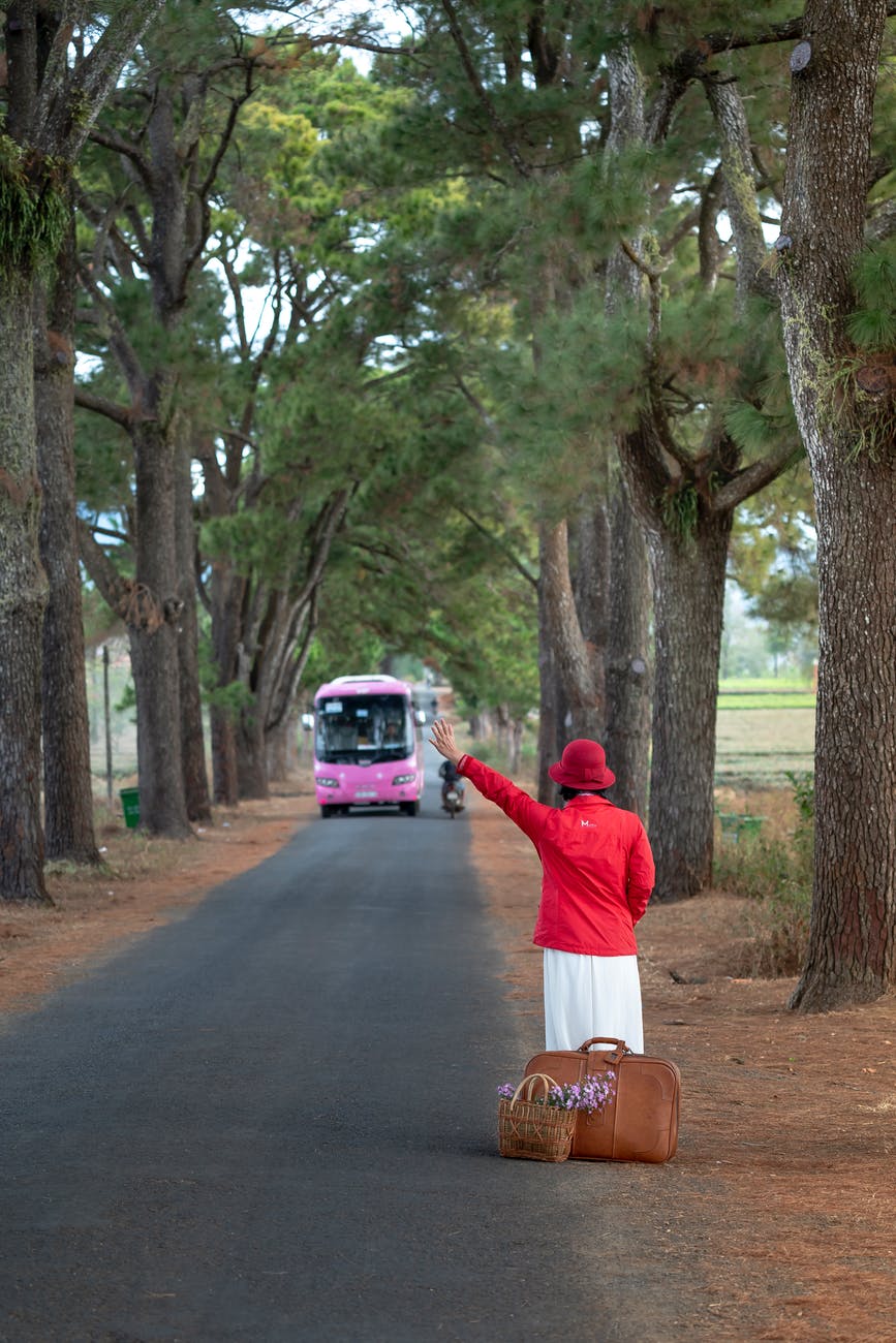 a woman catching a bus